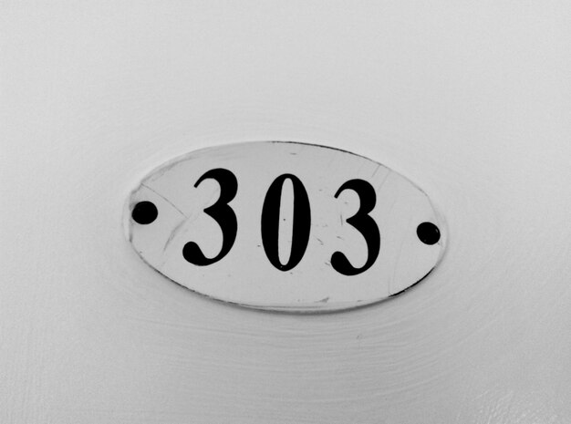 Photo close-up of number on door