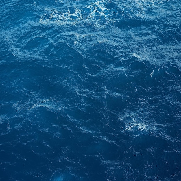 Photo a close up of the oceans surface with a blue background