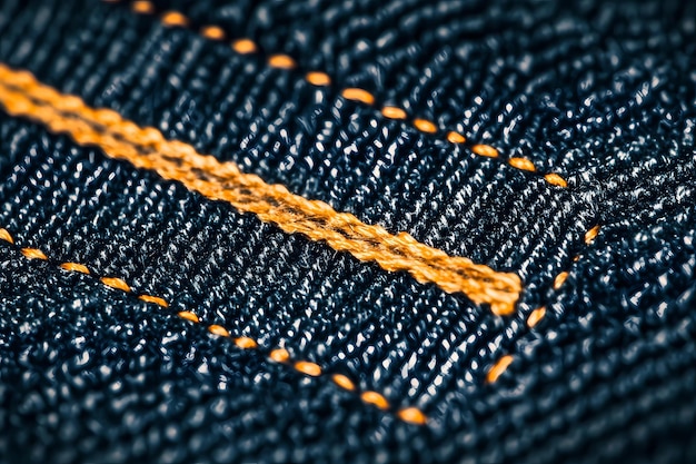 Photo a close up of a pair of blue jeans with a gold line