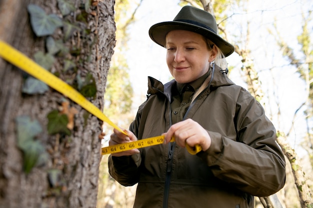 Close up on park ranger in woods