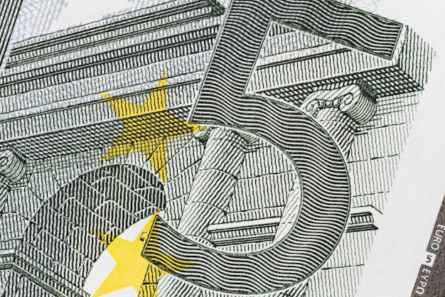 Close-up of a part five euro bill