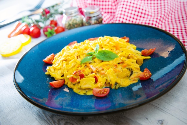 Close-up of pasta in plate on table