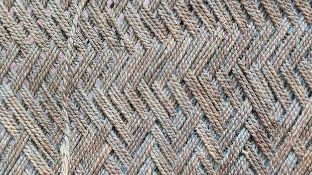 A close up of a pattern of braided yarn