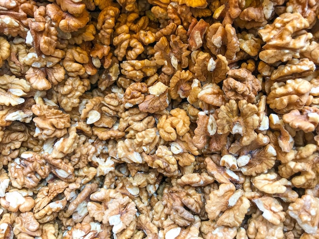 Close-up of peeled walnuts healthy fresh food background