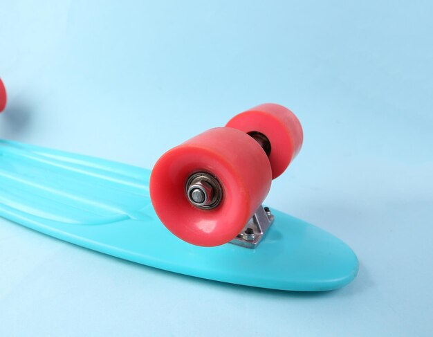 Close up penny board wheel on blue background