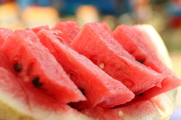 Close up photography of the divided into slices watermelon and melonOutdoor picnic