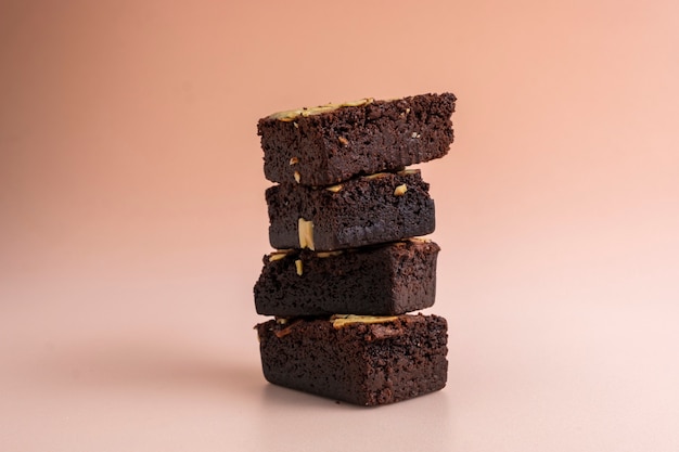 Close up on pile of fleshly baked almond brownies