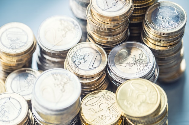 Close-up a pile of new euro coins in other compositions.