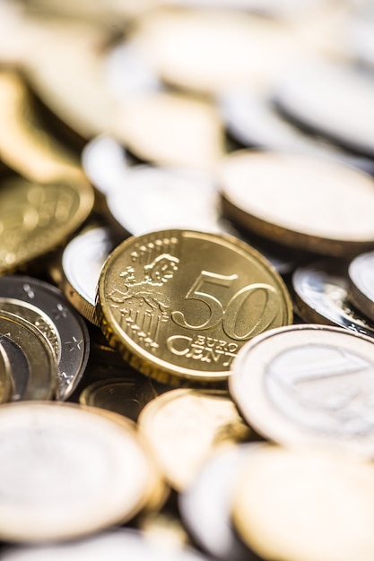 Close-up a pile of new euro coins in other compositions.