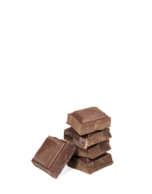 Close-up of Piled Up Chocolate Cubes Isolated on White Background