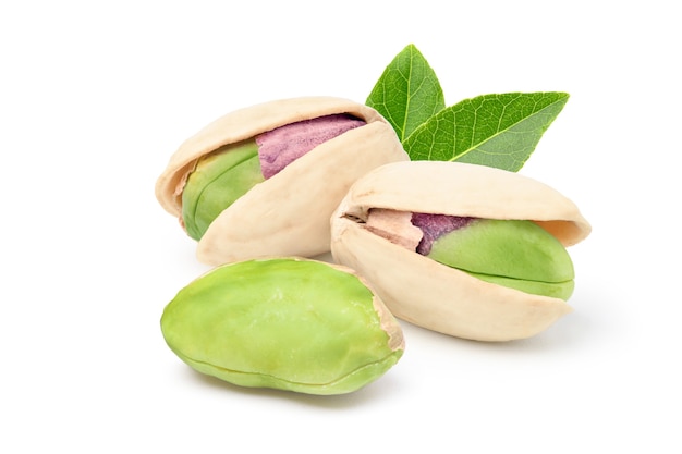 Close-up of Pistachio nuts isolated on a white surface