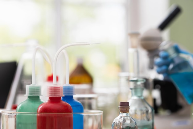 Close-up of plastic bottles with a nozzles in a laboratory