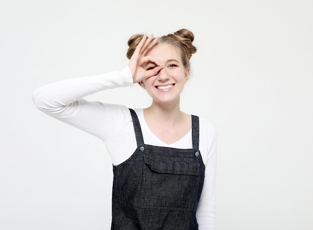 Close up portrait of beautiful joyful woman smiling demonstrating white teeth