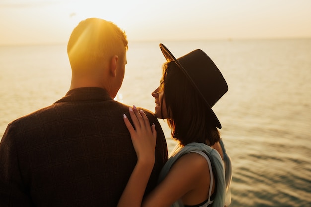 Close up portrait of a beautiful married couple at the beach.