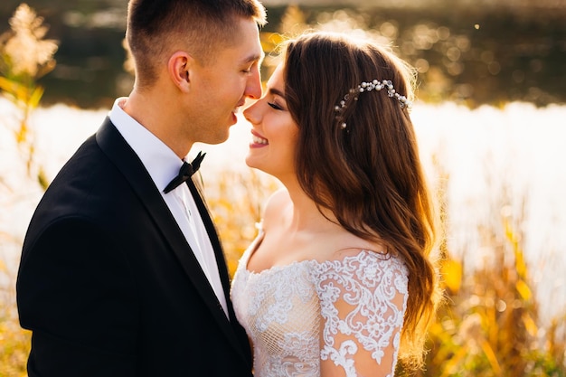 Close up portrait of a beautiful married couple at the park