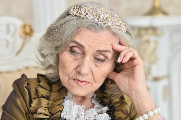 Close up portrait of beautiful senior woman Queen