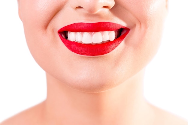 Close up portrait of beautiful wide smile with whitening teeth perfect red lips young fresh woman