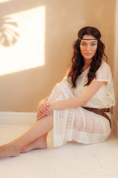 close up portrait of beautiful young stylish boho woman