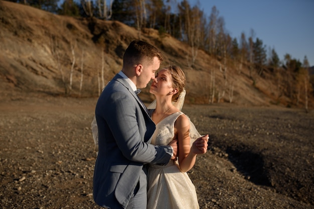 Close-up portrait of the bride and groom a moment before the kiss.