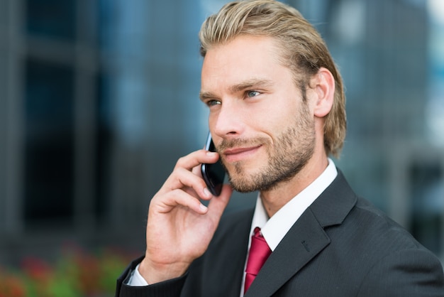 Close-up portrait of a businessman talking on the phone