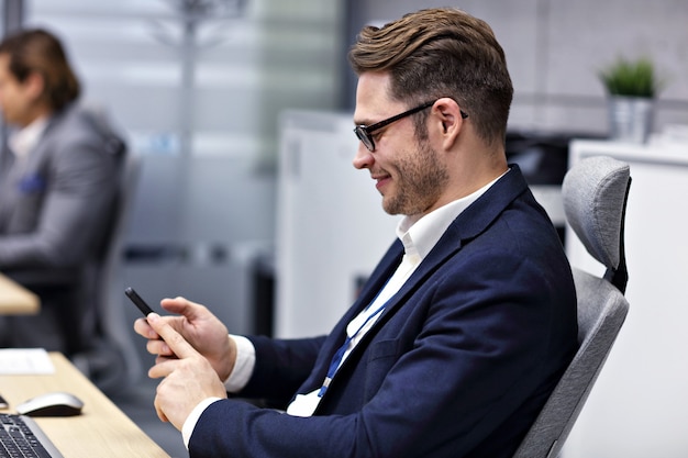 Close up portrait of businessman at workplace