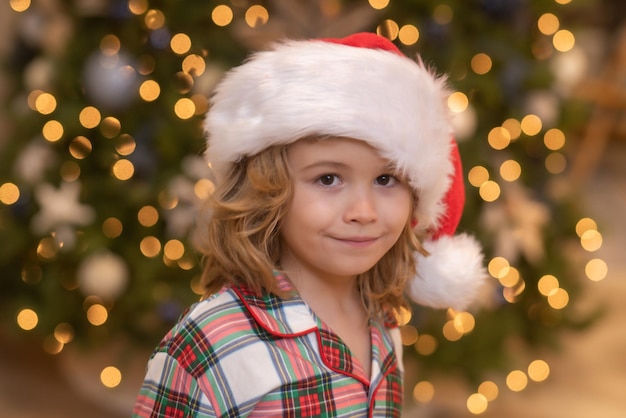 Close up portrait child at home on christmas little kid celebrating christmas or new year