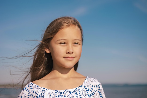 Close up Portrait of Happy Cute Girl in During Summer Vacation On Exotic Tropical Beach