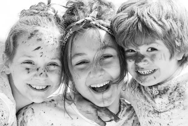 Close up portrait of happy excited litttle kids on holi color festival cute children with colorful p