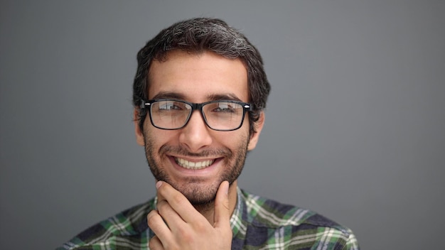 Close up portrait of middle age man with glasses smiling