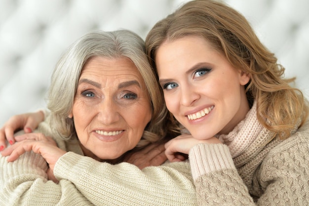 Close up portrait of mother and her adult daughter