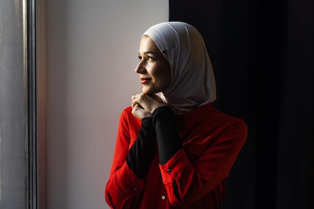 Close-up portrait of muslim woman weared in traditional islamic scarf. Islam religion.