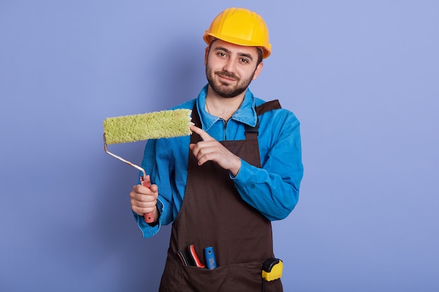 Close up portrait shot of repairman wearing hardhat