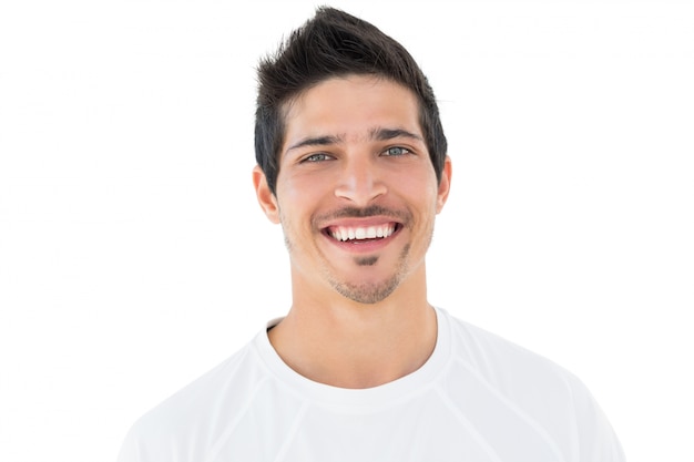 Close-up portrait of smiling handsome football fan