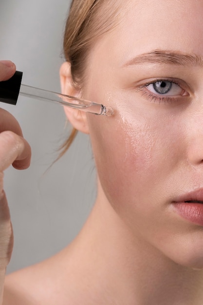 Close up on portrait of woman with hydrated skin