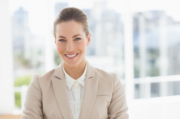 Close-up portrait of a young businesswoman smiling