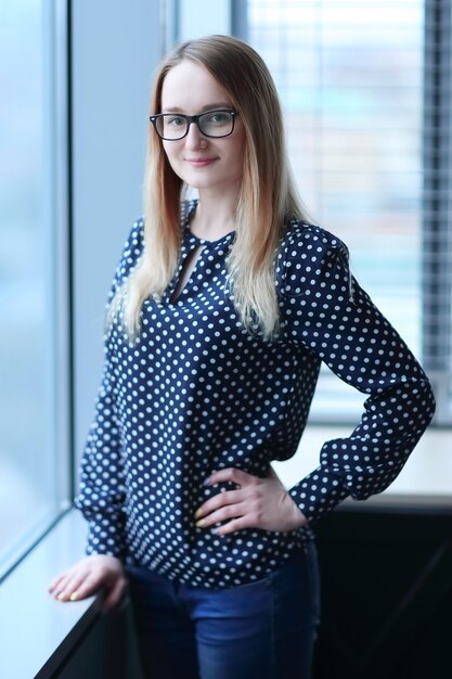 Close up.portrait of a young employee in the office.