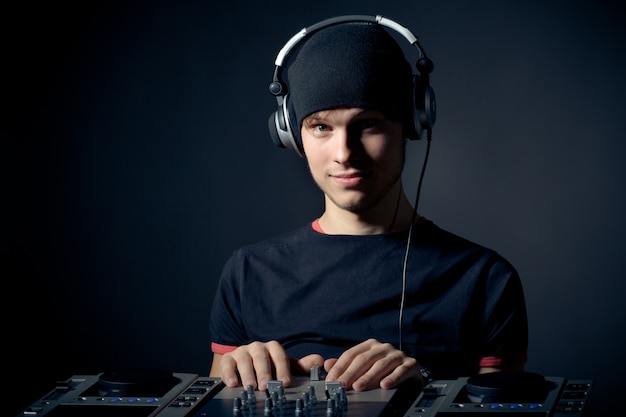 Close-up portrait of a young stylish DJ