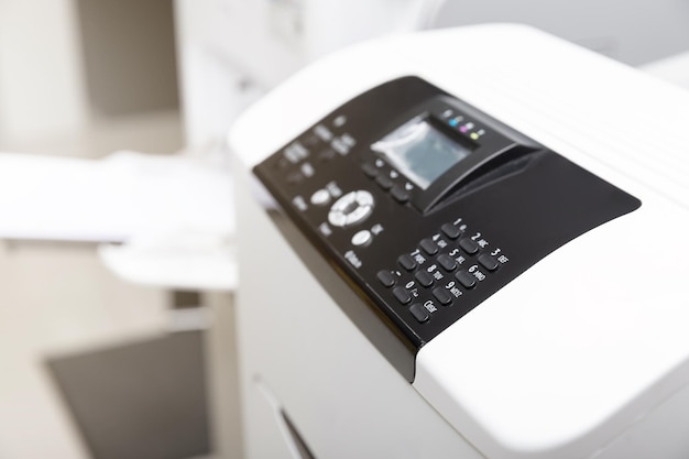 Close up of printer or photocopier control panel selective focus