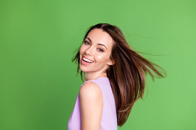 Close-up profile side view portrait of her she nice-looking attractive pretty charming lovely cheerful cheery girl enjoying season good mood news isolated over green color background