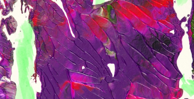 A close up of a purple and red leaf pattern