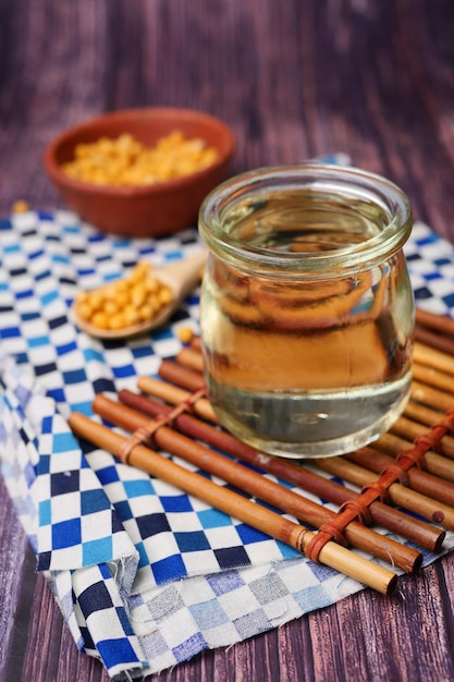 Close up of Raw soy bean seed oil in a container