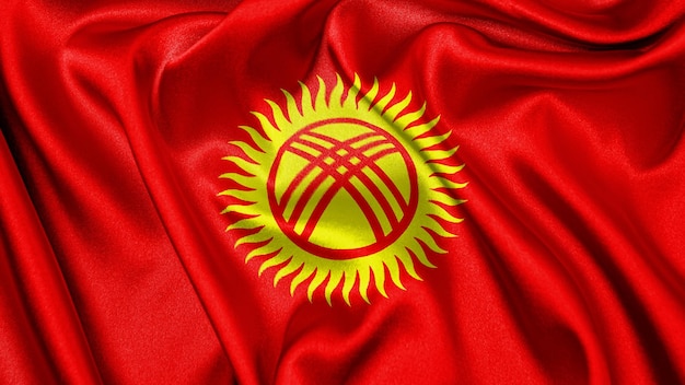 Close up realistic texture flag of Kyrgyzstan