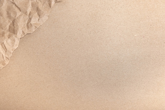 Close up of Recycled brown wrinkle crumpled old with paper page texture rough background. crease grunge parchment pattern vintage design