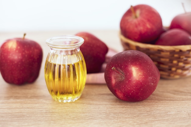 Close up red Apple fruit and apple cider vinegar juice