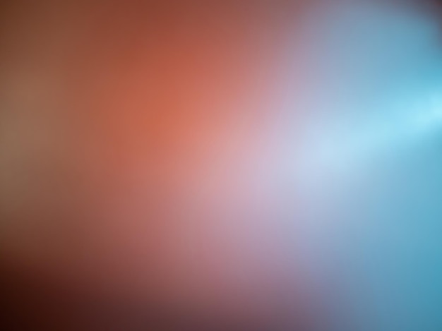 A close up of a red and blue background with a blurry background.