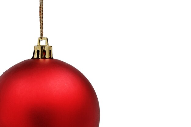 Close up red christmas ball on table