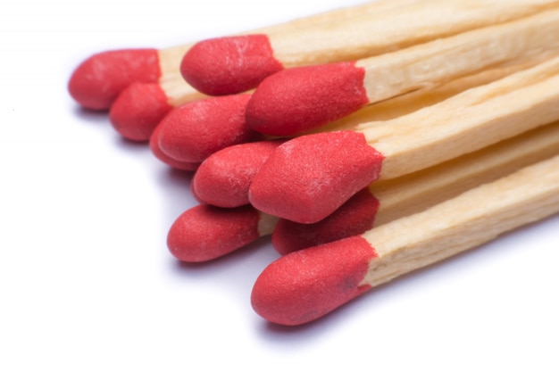 Close-up red match isolated on a white background