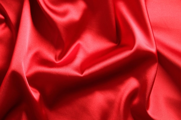 Close up of red satin fabric background