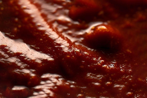 A close up of a red sauce