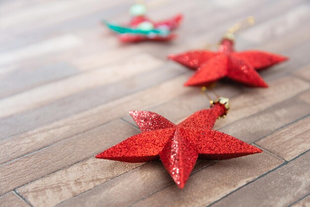 Close-up of red star shapes on table